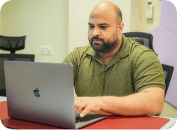 InvoZone team member working at a desk